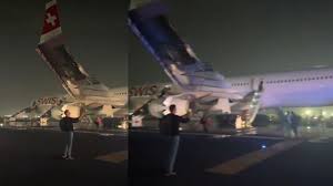 दिल्ली एयरपोर्ट हादसा नई दिल्ली, IGI airport fire news Delhi India, aviation accident Delhi NCR, flight emergency incident India aviation news, Swiss Air LX147 Delhi Zurich news, runway closure Delhi airport update, civil aviation incident India Delhi, airline safety news India Delhi NCR, breaking news Delhi airport हादसा, aviation emergency Delhi India news,#DelhiAirportFire, #IGIAirport, #SwissAir, #FlightLX147, #AviationNews, #BreakingNewsIndia, #DelhiNews, #AirportIncident, #PlaneFire, #EmergencyLanding, #RunwayClosed, #IndiaNews, #AirSafety, #FlightEmergency, #ZurichFlight,Delhi airport fire image, Swiss Air plane fire photo, IGI airport runway incident, emergency evacuation flight Delhi, विमान से धुआं निकलता हुआ, airplane engine fire Delhi, airport emergency slide evacuation, Zurich flight incident visuals,दिल्ली एयरपोर्ट हादसा, IGI Airport fire incident, Swiss Air flight LX147, Delhi airport plane fire, विमान में आग दिल्ली, Zurich flight emergency, Delhi aviation news, flight engine failure India, runway 28 closed Delhi, airline emergency evacuation, दिल्ली विमान हादसा, airport breaking news India,
