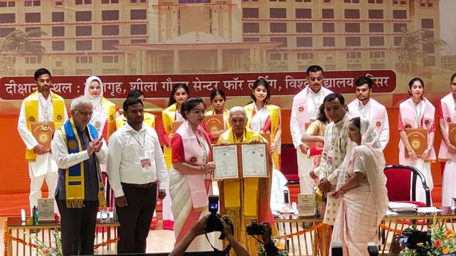 Anandiben Patel Aligarh Visit, Aligarh Convocation Ceremony, Raja Mahendra Pratap Singh State University, UP Governor News, Aligarh Education News, Uttar Pradesh Latest News, University Medal Distribution Ceremony, Digital Education India, UP Higher Education News,राज्यपाल आनंदीबेन पटेल अलीगढ़, अलीगढ़ विश्वविद्यालय दीक्षांत समारोह, राजा महेंद्र प्रताप सिंह राज्य विश्वविद्यालय, अलीगढ़ लेटेस्ट न्यूज, उत्तर प्रदेश शिक्षा समाचार, यूपी राज्यपाल खबर, अलीगढ़ एजुकेशन न्यूज, 50 मेधावी छात्रों को मेडल, डिजिलॉकर शिक्षा व्यवस्था, उत्तर प्रदेश यूनिवर्सिटी न्यूज,#AnandibenPatel, #AligarhNews, #AligarhUniversity, #UPGovernor, #UttarPradeshNews, #EducationNews, #ConvocationCeremony, #RajaMahendraPratapSinghUniversity, #StudentSuccess, #DigitalEducation,