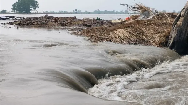 यूपी में बाढ़ का खतरा, यूपी बाढ़ अलर्ट, उत्तर प्रदेश बाढ़ 2026, यूपी में बाढ़ की स्थिति, यूपी की नदियां खतरे के निशान से ऊपर, घाघरा नदी बाढ़, गंगा नदी बाढ़, सरयू नदी जलस्तर, शारदा नदी जलस्तर, राप्ती नदी बाढ़, वाराणसी गंगा बाढ़, प्रयागराज बाढ़, सीतापुर बाढ़, बहराइच बाढ़, बाराबंकी बाढ़, गोंडा बाढ़, अयोध्या बाढ़, चित्रकूट बाढ़, उन्नाव बाढ़, कन्नौज बाढ़, उत्तर प्रदेश बारिश, यूपी बारिश अलर्ट, यूपी मौसम अपडेट, यूपी फ्लड अलर्ट, बाढ़ प्रभावित गांव, उत्तर प्रदेश बाढ़ न्यूज, UP Flood Alert 2026, Uttar Pradesh Flood News, UP Flood News Today, Uttar Pradesh Flood Alert, UP Flood Situation, UP Rivers Above Danger Mark, Ghaghra River Flood, Ganga Flood Uttar Pradesh, Saryu River Water Level, Sharda River Flood, Rapti River Flood, Varanasi Ganga Flood, Prayagraj Flood, Sitapur Flood, Bahraich Flood, Barabanki Flood, Gonda Flood, Ayodhya Flood, Chitrakoot Flood, Unnao Flood, Kannauj Flood, UP Rain Alert, Uttar Pradesh Weather News, Flood Affected Villages UP,यूपी में बाढ़ का खतरा कितने गांवों पर, यूपी में कौन सी नदियां खतरे के निशान से ऊपर, आज यूपी में बाढ़ की स्थिति, उत्तर प्रदेश में बाढ़ का अलर्ट, बहराइच घाघरा नदी का जलस्तर, वाराणसी गंगा का जलस्तर कितना है, प्रयागराज में बाढ़ की स्थिति, सीतापुर में बाढ़ का खतरा, बाराबंकी सरयू नदी जलस्तर, गोंडा घाघरा नदी बाढ़, चित्रकूट मंदाकिनी नदी बाढ़, UP Flood Alert Today, Uttar Pradesh Flood Latest News, Ganga River Flood Varanasi, Ghaghra River Flood Bahraich, UP Flood Affected Villages,#UPFloodAlert #UPFloodNews #UttarPradeshFlood #UPWeather #UPRainAlert #FloodAlert #FloodNews #GangaFlood #YamunaFlood #GhaghraRiver #SaryuRiver #RaptiRiver #VaranasiFlood #PrayagrajFlood #SitapurFlood #BahraichFlood #BarabankiFlood #GondaFlood #AyodhyaFlood #ChitrakootFlood #UnnaoNews #UttarPradeshNews #यूपीबाढ़ #बाढ़अलर्ट #उत्तरप्रदेशबाढ़ #यूपीमौसम #गंगाबाढ़ #घाघराबाढ़ #सरयूबाढ़ #राप्तीबाढ़ #वाराणसीबाढ़ #प्रयागराजबाढ़ ,
